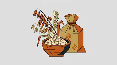 A bowl and a sack of grain sit in front of stalks of grain.
