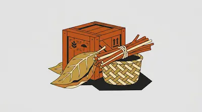 A wooden shipping crate stands behind a large dried leaf and a woven basket topped with a bundle of sticks.