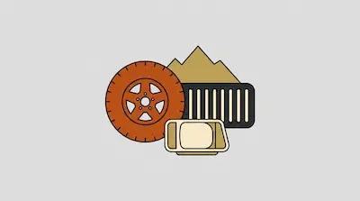 A stylized graphic of a brown tire, tan mountain peaks, a black grille, and a tan headlight.