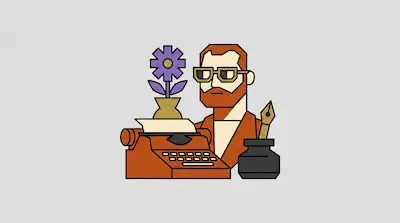 A man with a red beard and glasses sits behind a typewriter with a purple flower and an inkwell.