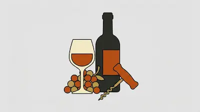 A dark wine bottle, a glass of wine, a bunch of grapes, and a corkscrew are grouped together.