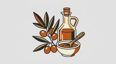An olive branch with orange olives next to a glass bottle and a bowl of oil with a spoon.