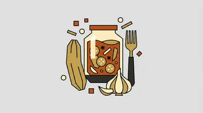 A jar filled with sliced vegetables and spices, a whole cucumber, a garlic bulb with a loose clove, and a fork.