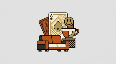 An ace of spades playing card, a smiley face, a teacup, and a couch grouped together.