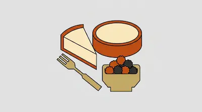 A slice of cheesecake, a whole cheesecake, a bowl of berries, and a fork.