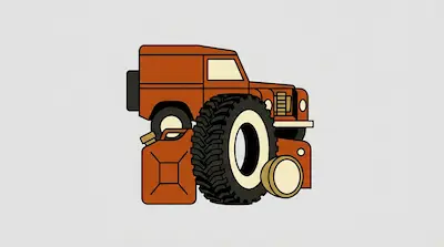 An orange off-road vehicle with a large knobby tire and a jerry can in the foreground.