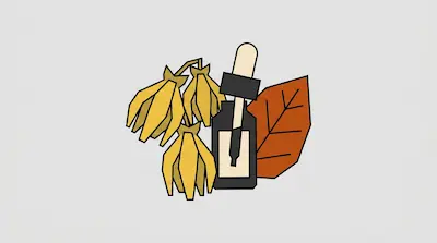 Three yellow flowers, a dark dropper bottle, and a brown leaf.