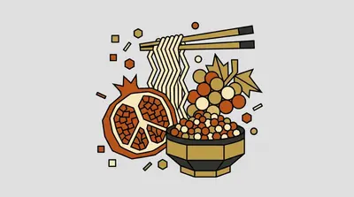 A split pomegranate, long noodles lifted by chopsticks, a bunch of grapes with leaves, and a bowl heaped with small beans.