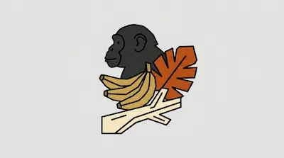 A dark gray gorilla head, a bunch of yellow bananas, an orange leaf, and a tan piece of wood.