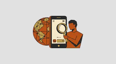 A person holds a magnifying glass over a smartphone screen next to a globe with a network of lines.