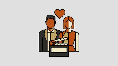 A male figure in a suit and a female figure standing side by side with a heart above them and a film clapperboard in front.
