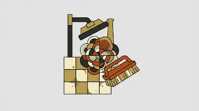 A shower head, a scrub brush, and a tiled wall with a central floral motif in shades of brown and orange.
