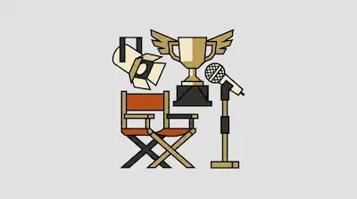 A spotlight, a winged trophy, a director's chair, and a microphone on a stand.