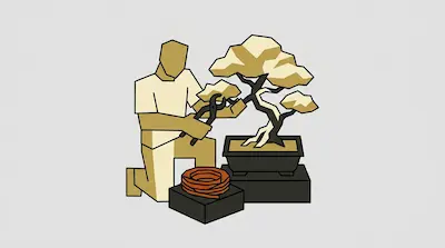 A person kneels to prune a bonsai tree with shears, with a coil of wire resting nearby.