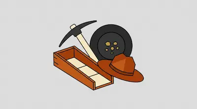 Flat illustration of gold mining tools including a pickaxe, a wooden sluice box, and a brown hat on a gray background