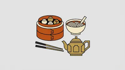 A bamboo steamer with dumplings, a bowl of noodles, a teapot, and a pair of chopsticks.
