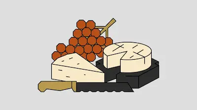 A wedge of cheese, a round cheese wheel with a slice removed, a bunch of grapes, and a serrated knife.