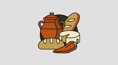 A clay pot with handles, two bread loaves, a wheel of cheese, and a pepper clustered together.